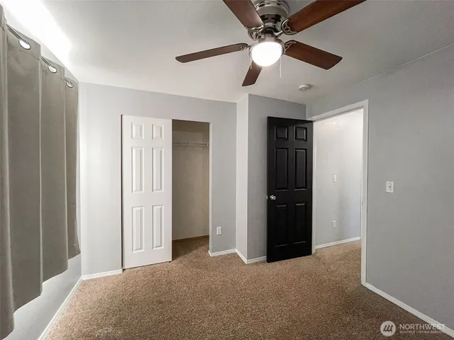 a view of a livingroom with a window