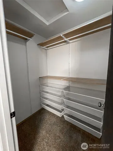 a view of balcony with wooden floor