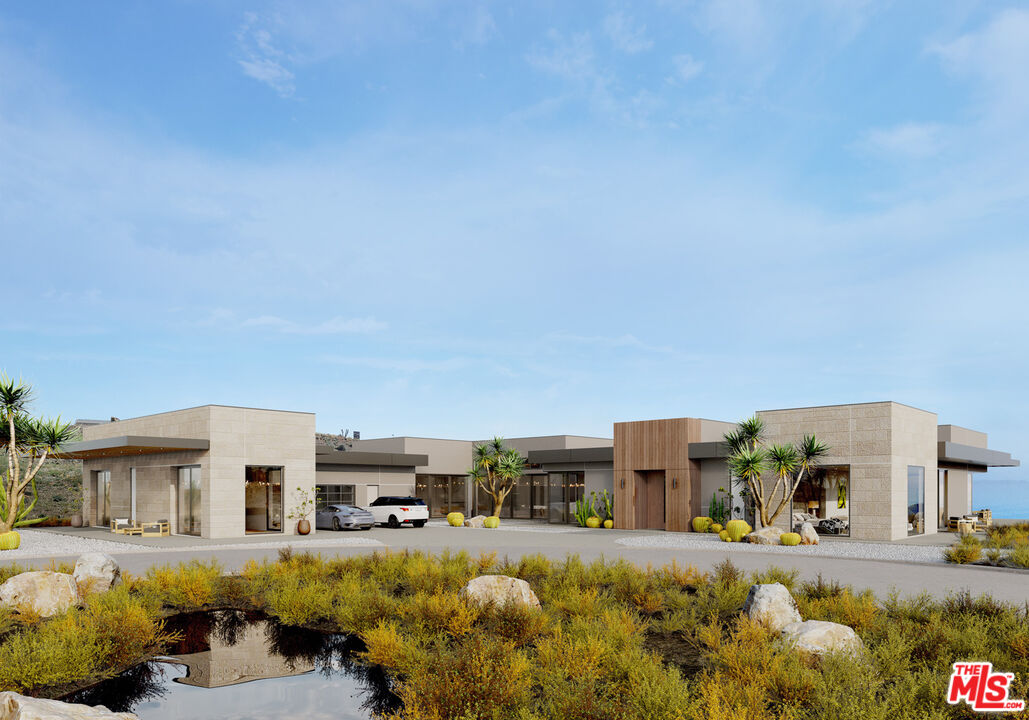 9522 Cotharin Road Malibu, CA 90265 - Photo 14 of 25 a front view of a house with a yard