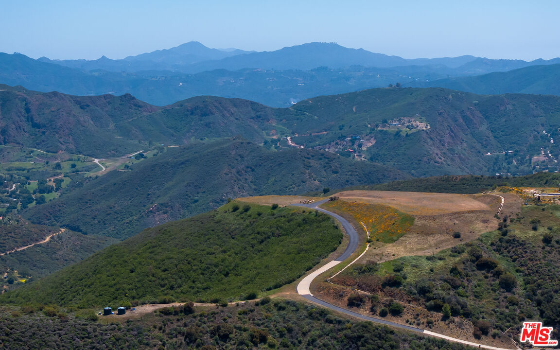 9522 Cotharin Road Malibu, CA 90265 - Photo 2 of 25 an aerial view of mountains residential house and green space
