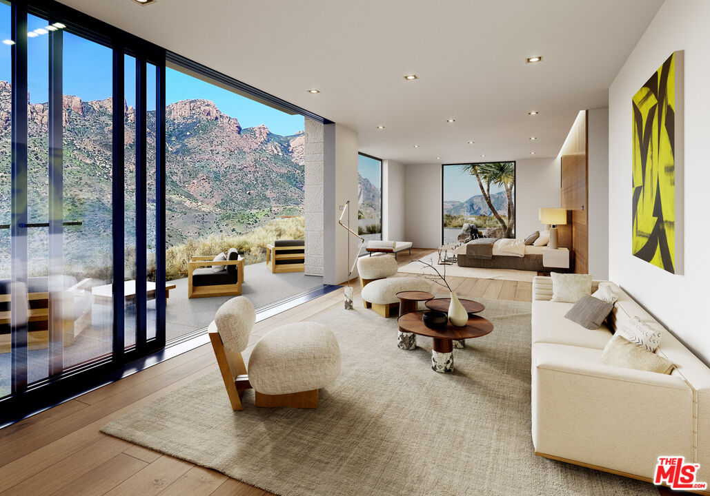 9522 Cotharin Road Malibu, CA 90265 - Photo 21 of 25 a view of a livingroom with workspace and a large window