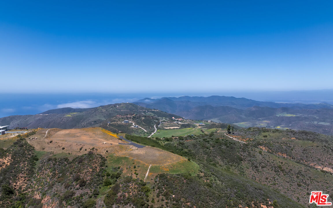 9522 Cotharin Road Malibu, CA 90265 - Photo 6 of 25 an aerial view of ocean with trees