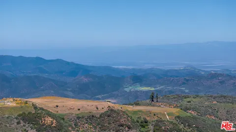 a view of lake with mountain