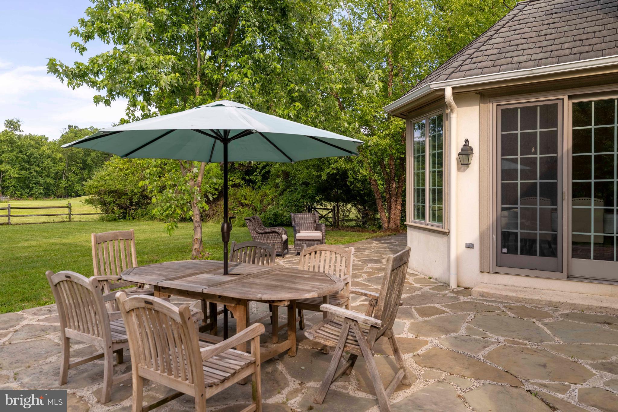 265 Walter Road Chalfont, PA 18914 - Photo 51 of 83 Stone patio and entrance to breakfast room