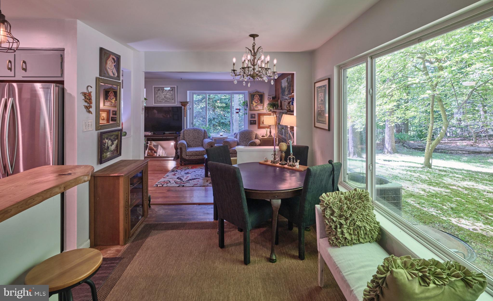 4831 Mountain Top Road West, Unit W New Hope, PA 18938 - Photo 14 of 28 Charming dining space with nature views.