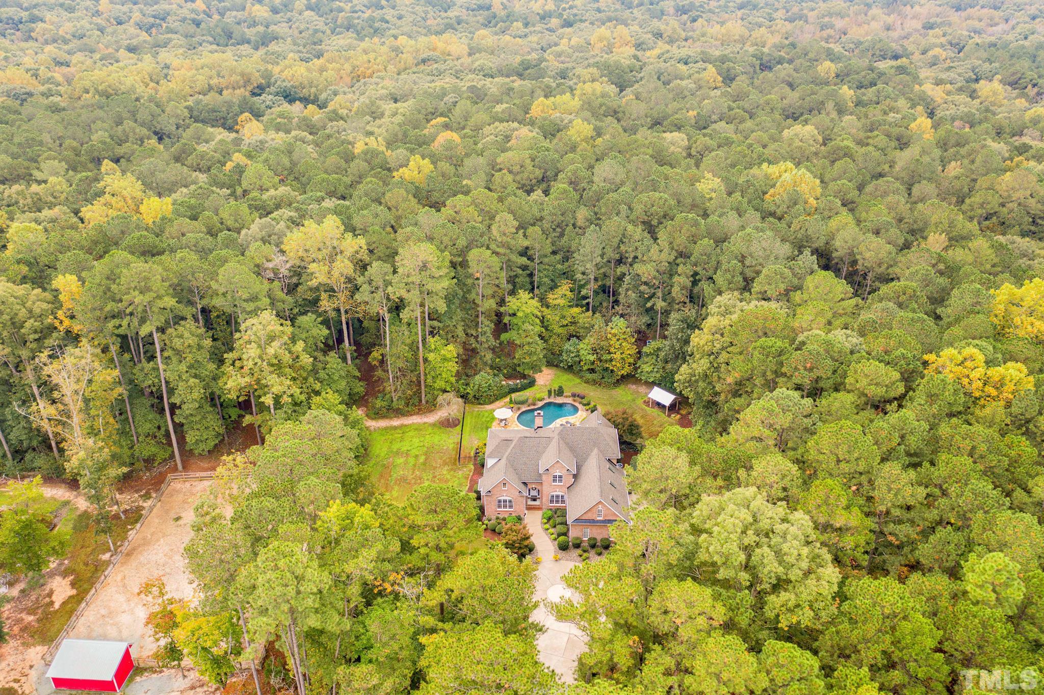 3249 Grand Oak Lane New Hill, NC 27562 - Photo 44 of 65 a bathroom with a sink and a yard