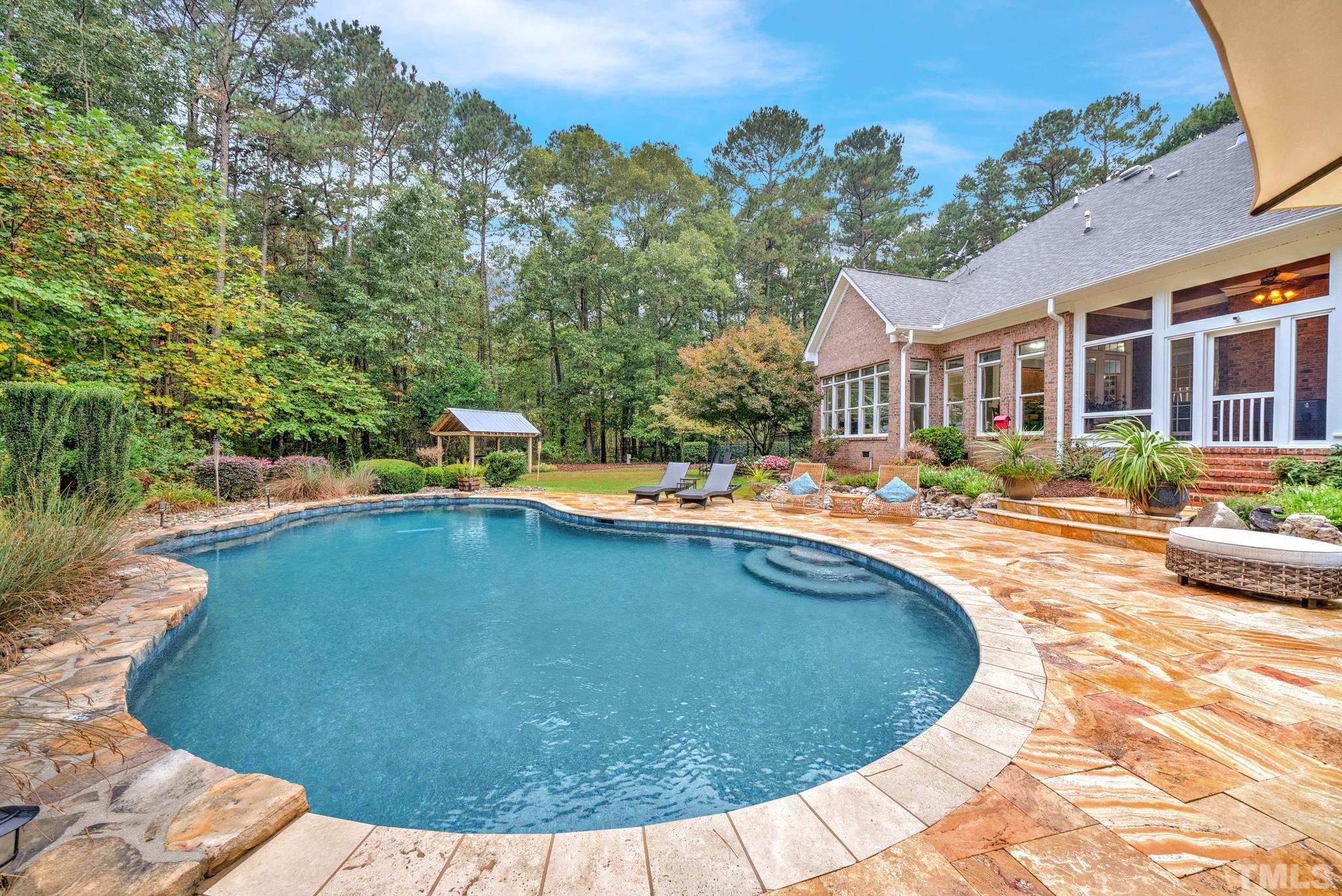 3249 Grand Oak Lane New Hill, NC 27562 - Photo 47 of 65 a view of swimming pool and outdoor space