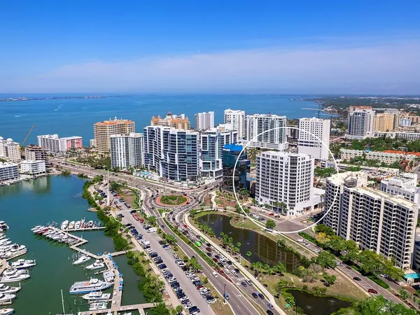 a view of a city with tall buildings
