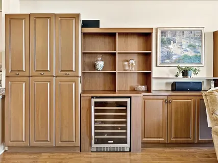 a view of cabinets and window