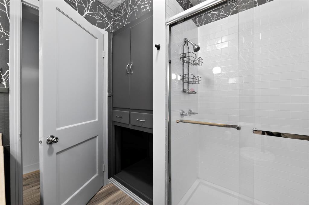 5485 Highway 7 Marlin, TX 76661 - Photo 18 of 36 Full bath with a shower stall and light wood finished floors