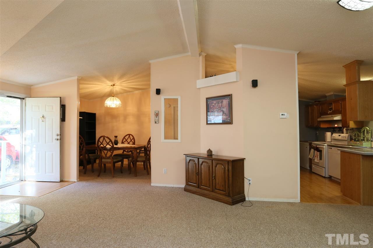 323 Aquilla Road, Unit A Benson, NC 27504 - Photo 16 of 25 a living room with furniture