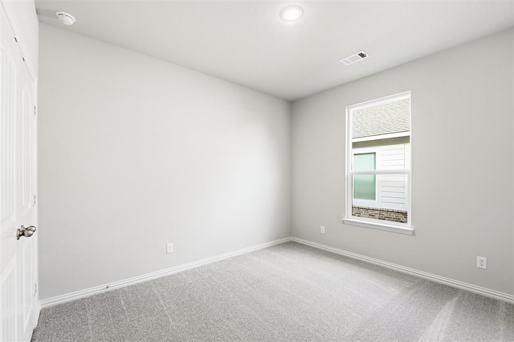 1244 Sabine River Lane Springtown, TX 76082 - Photo 15 of 26 an empty room with a window