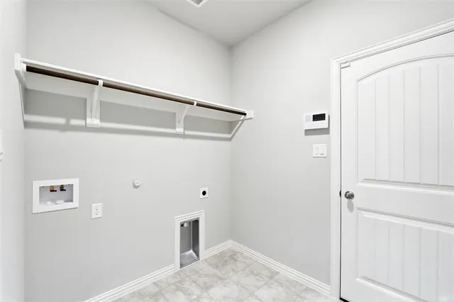 a view of storage and utility room