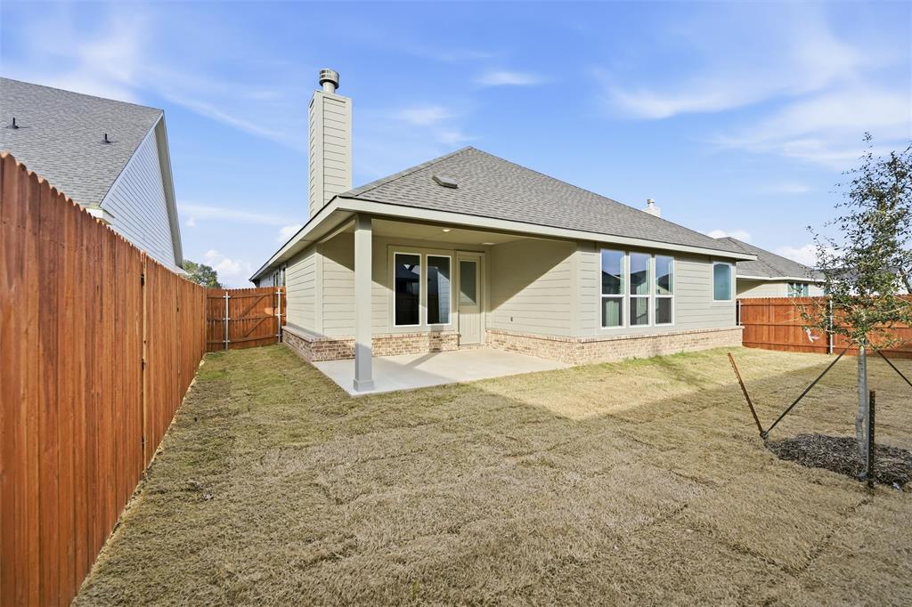 1244 Sabine River Lane Springtown, TX 76082 - Photo 23 of 26 a bathroom with a sink and a yard