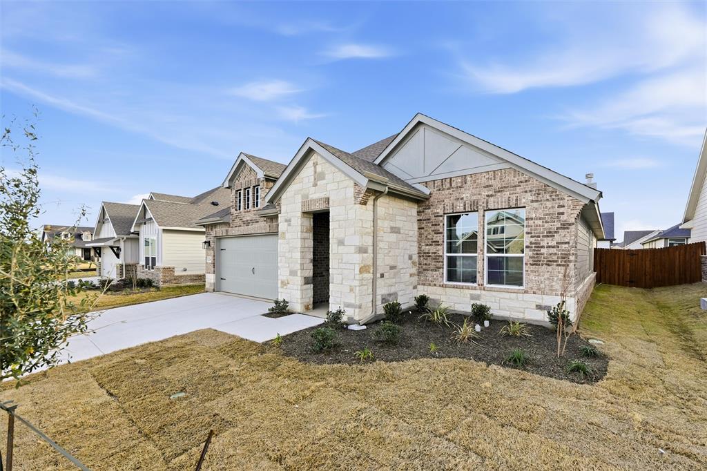 1244 Sabine River Lane Springtown, TX 76082 - Photo 3 of 26 a view of a house with a yard