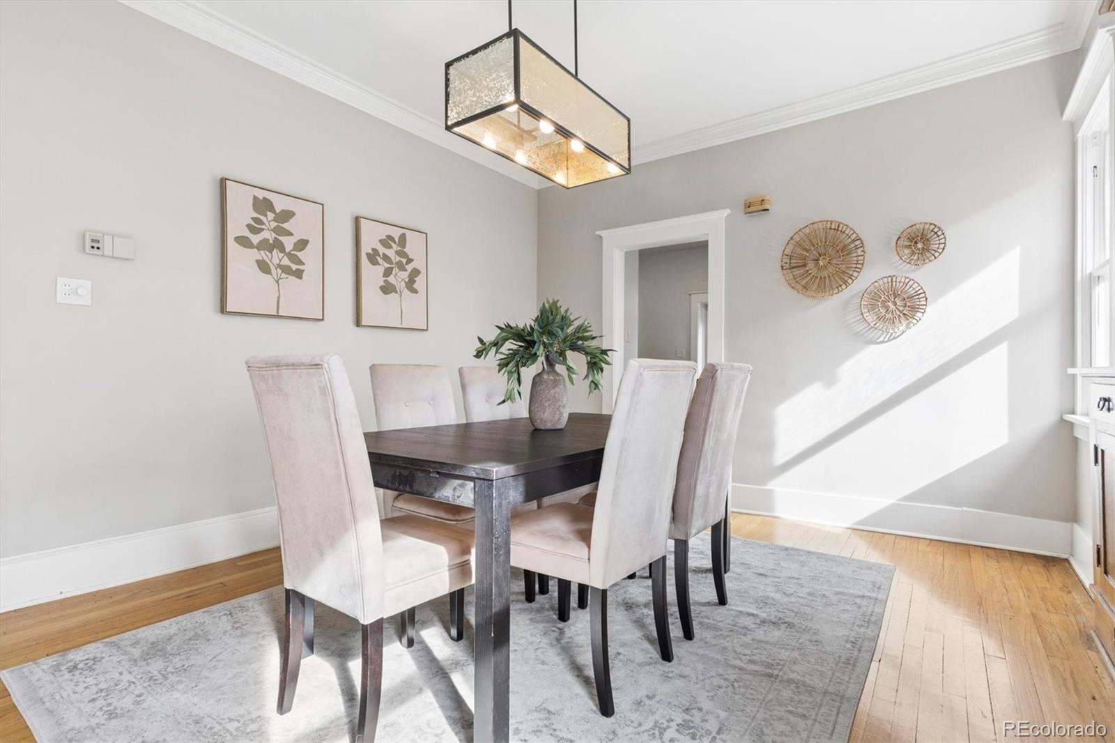 736 York Street Denver, CO 80206 - Photo 14 of 50 a dining room with furniture and window