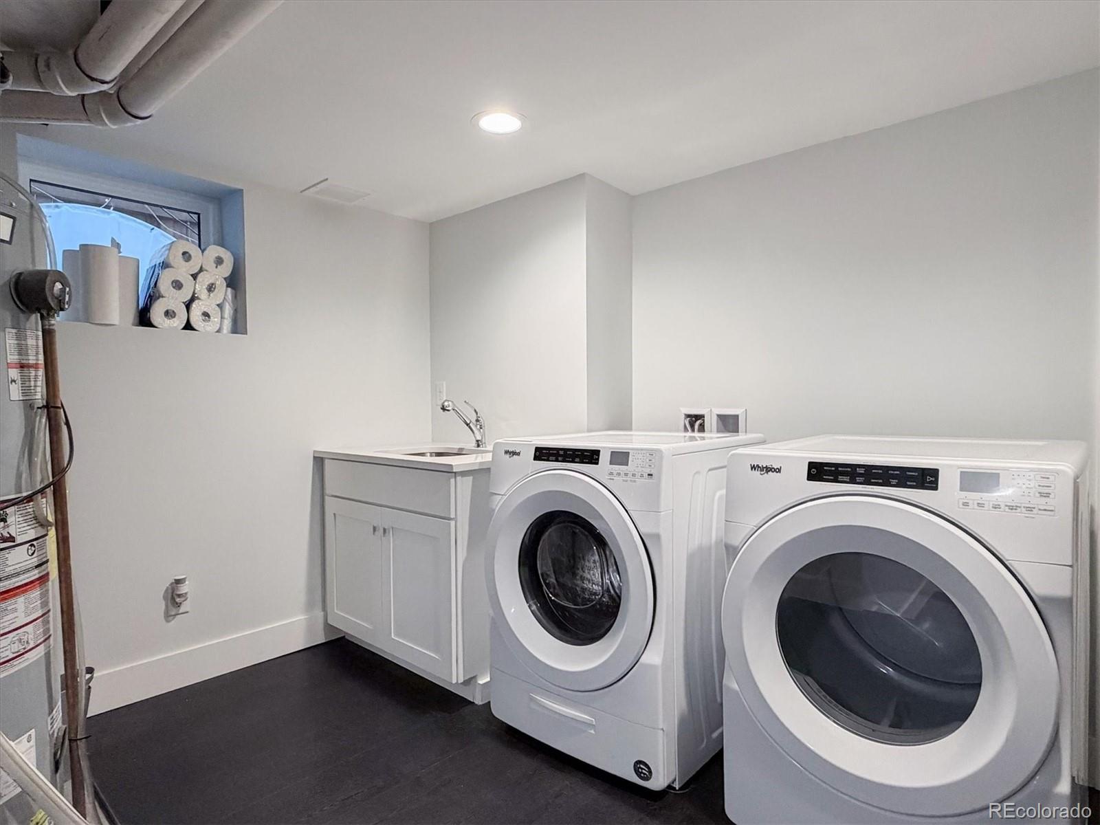 736 York Street Denver, CO 80206 - Photo 44 of 50 a utility room with dryer and washer