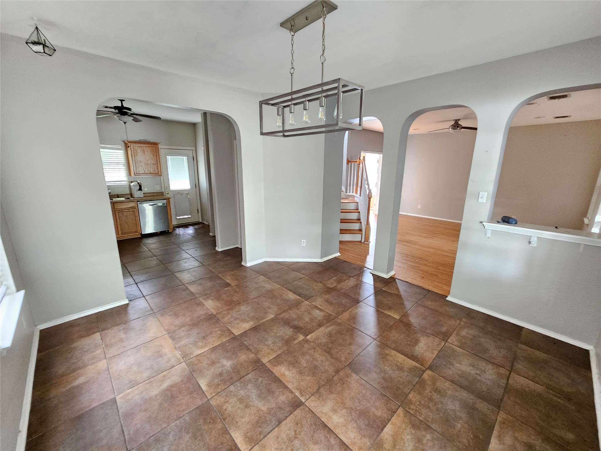 4672 Mather Kyle, TX 78640 - Photo 7 of 28 a view of a hallway with wooden floor and a living room