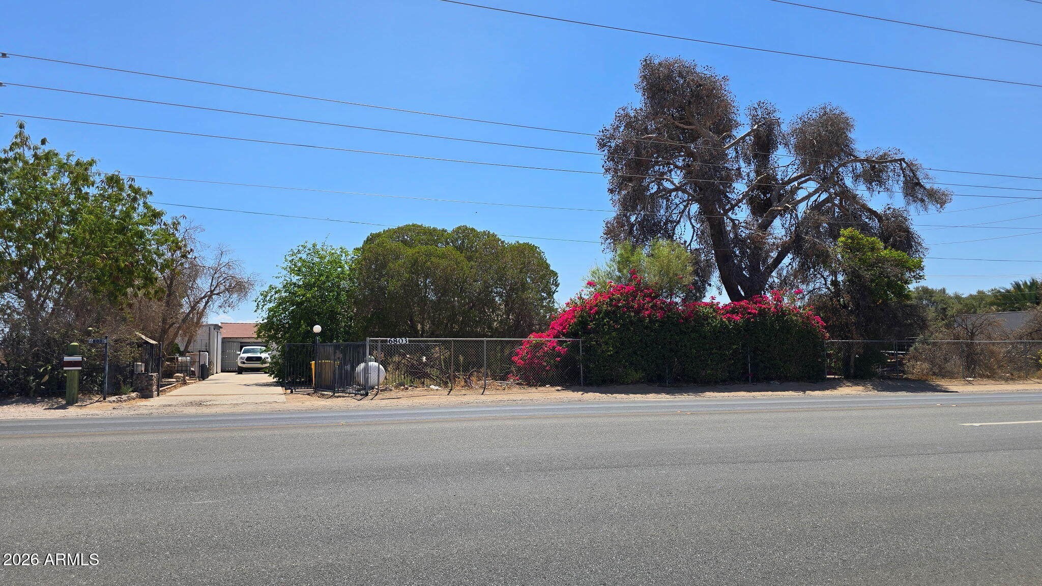 6803 South Miller Road Buckeye, AZ 85326 - Photo 35 of 50 a view of road and a building