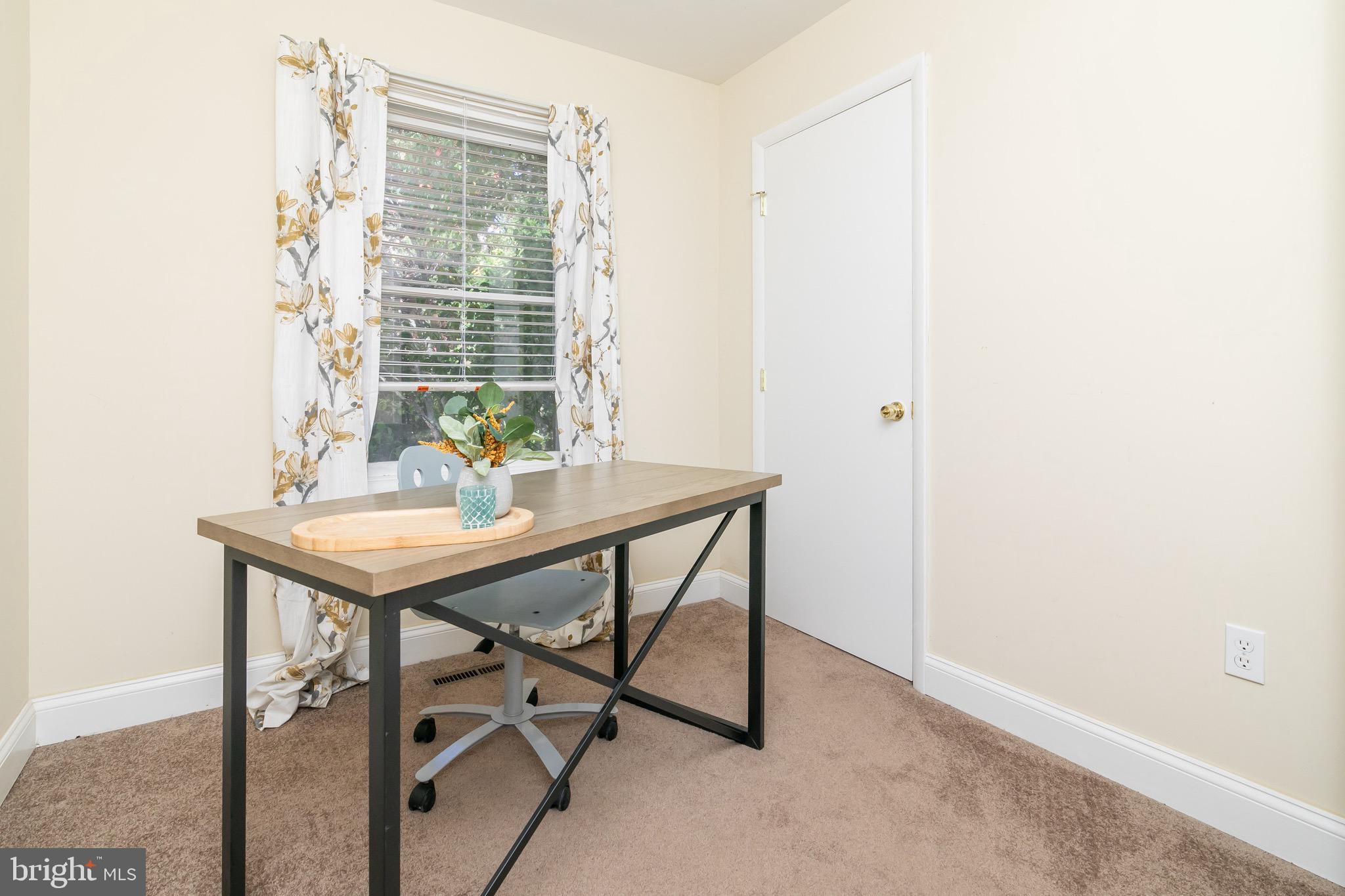 21633 Wetipquin Road Tyaskin, MD 21865 - Photo 36 of 88 a view of a room that has a table and chairs in it