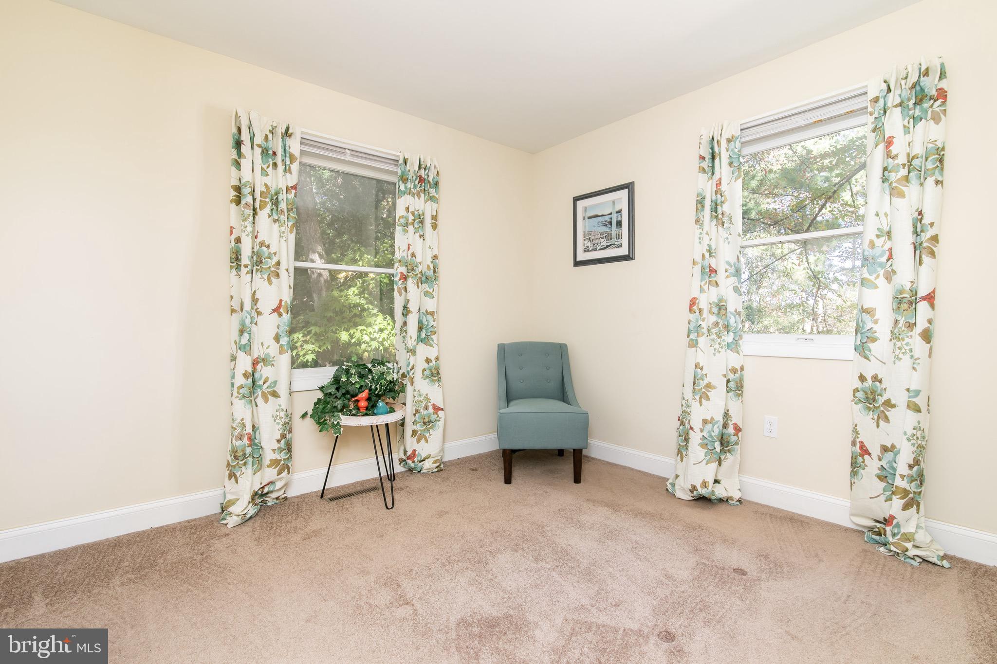 21633 Wetipquin Road Tyaskin, MD 21865 - Photo 37 of 88 a living room with furniture and a window