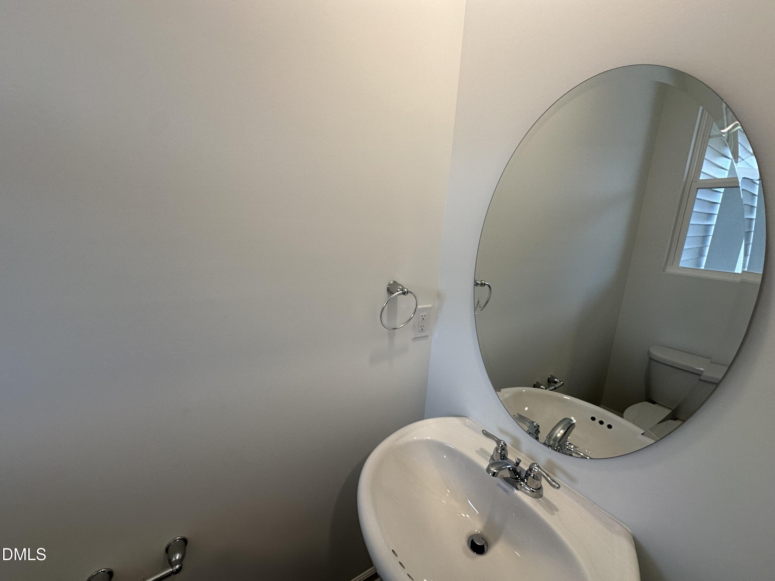 2917 Hickory Fld Drive Raleigh, NC 27616 - Photo 11 of 28 a bathroom with a sink and mirror