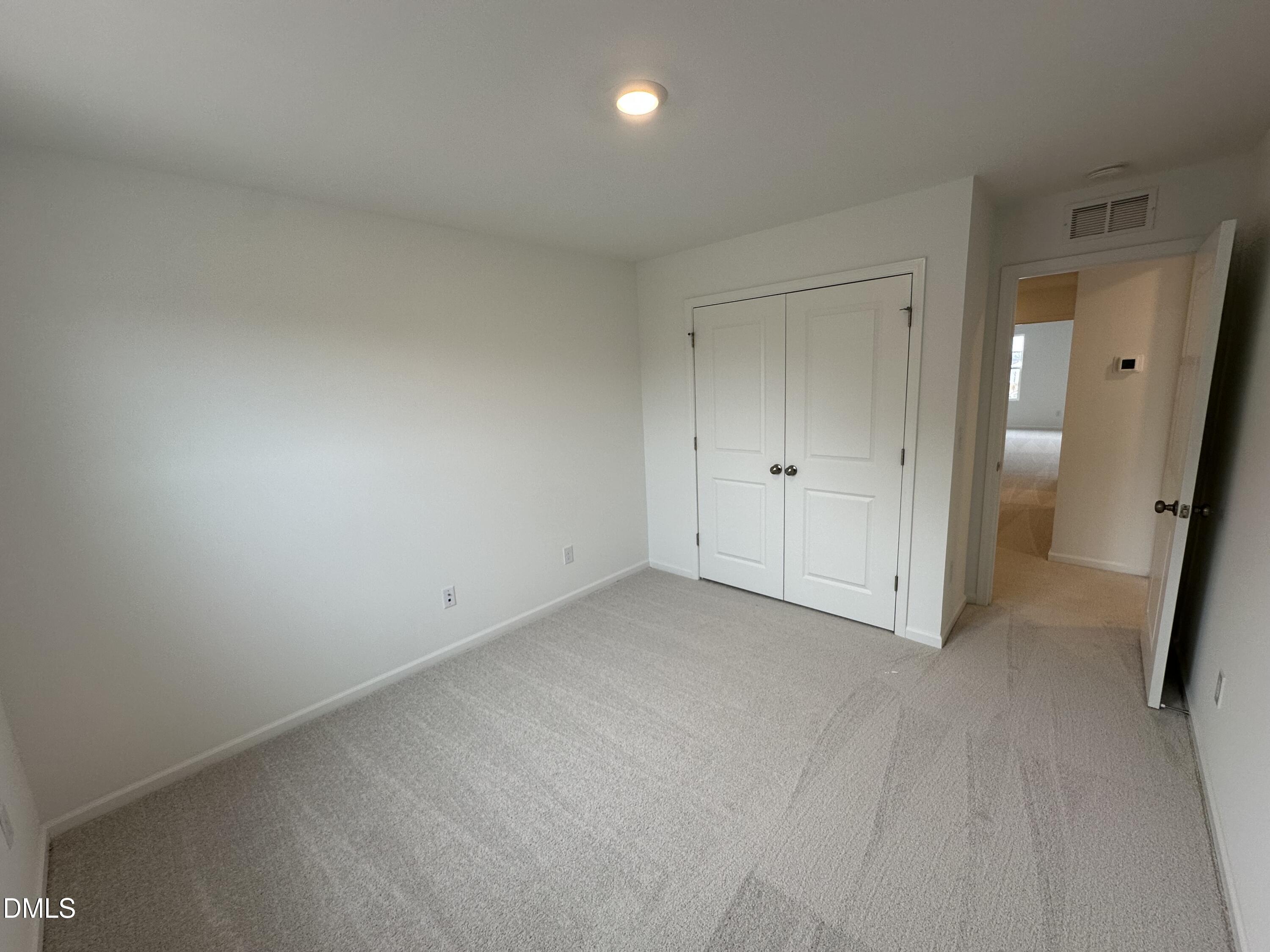 2917 Hickory Fld Drive Raleigh, NC 27616 - Photo 16 of 28 wooden floor and cabinet in an empty room