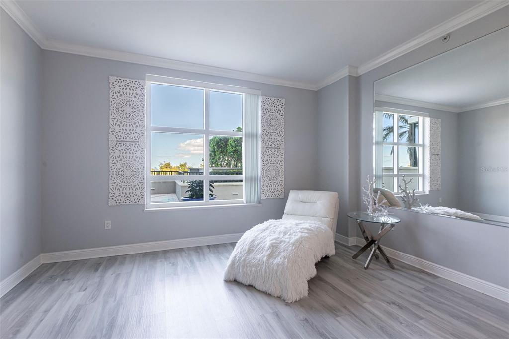 3329 Sunset Key Circle, Unit 107 Punta Gorda, FL 33955 - Photo 18 of 76 a bedroom with a bed and window