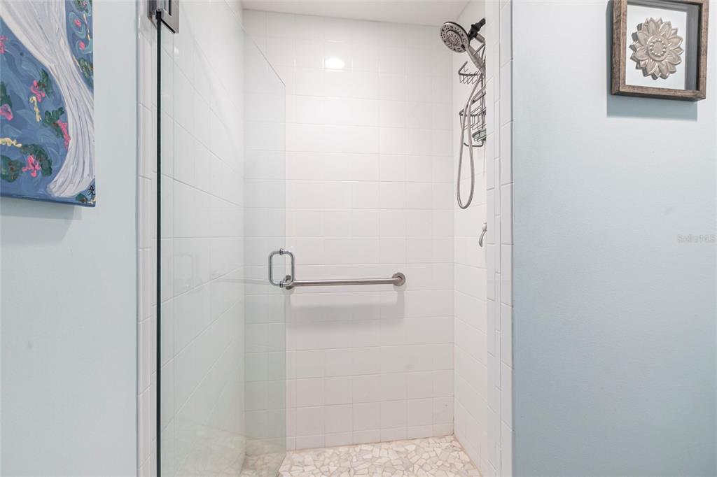 3329 Sunset Key Circle, Unit 107 Punta Gorda, FL 33955 - Photo 28 of 76 a bathroom with a shower