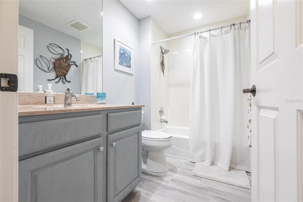 3329 Sunset Key Circle, Unit 107 Punta Gorda, FL 33955 - Photo 31 of 76 a bathroom with a sink a toilet and shower