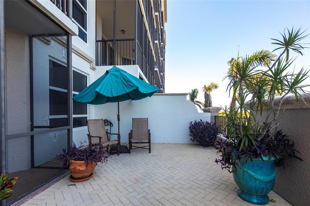 3329 Sunset Key Circle, Unit 107 Punta Gorda, FL 33955 - Photo 37 of 76 a view of balcony with outdoor seating and potted plants