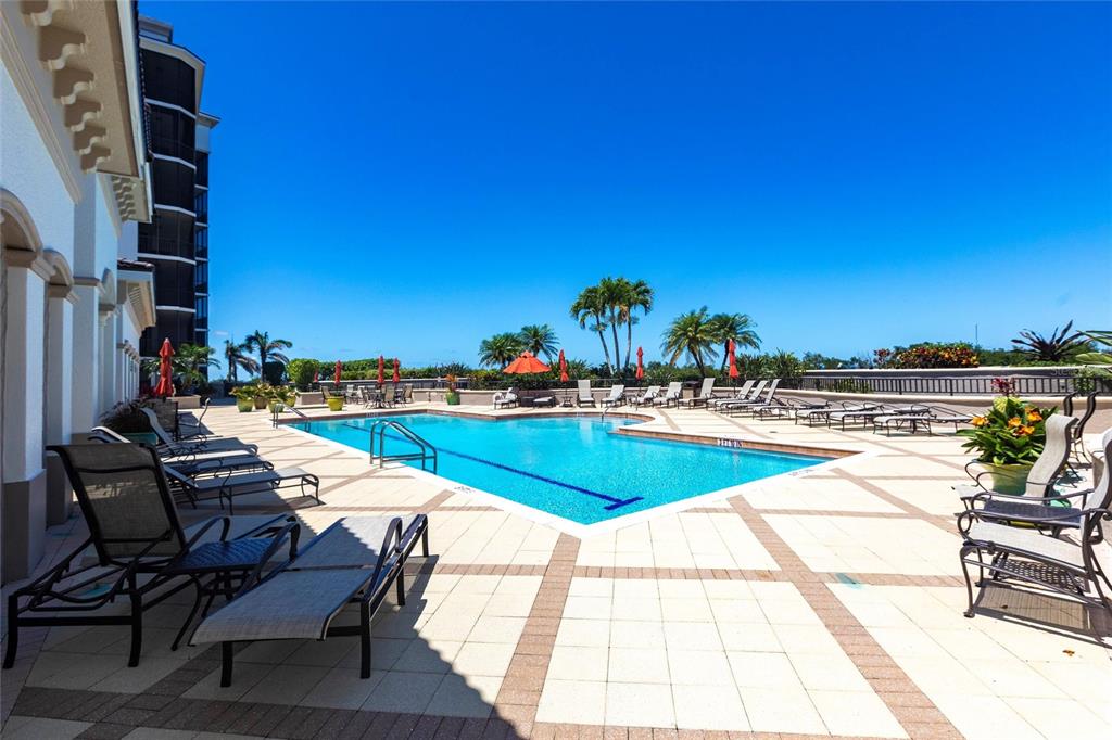 3329 Sunset Key Circle, Unit 107 Punta Gorda, FL 33955 - Photo 44 of 76 a view of swimming pool with outdoor seating and city view