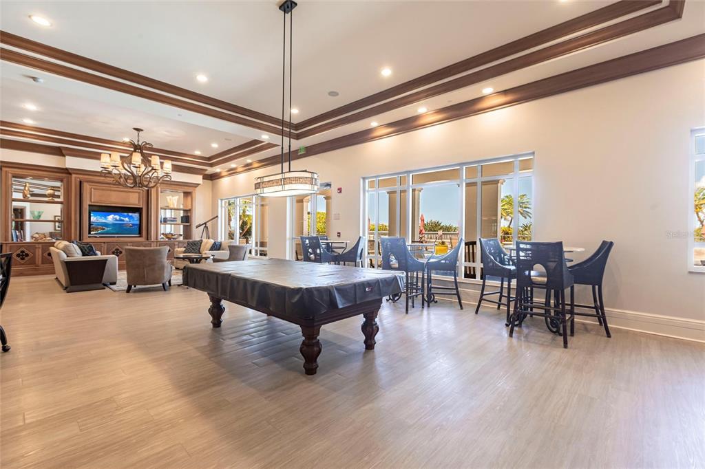 3329 Sunset Key Circle, Unit 107 Punta Gorda, FL 33955 - Photo 48 of 76 a outdoor space with lots of furniture and wooden floor