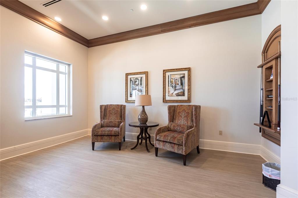 3329 Sunset Key Circle, Unit 107 Punta Gorda, FL 33955 - Photo 53 of 76 a living room with furniture and a window