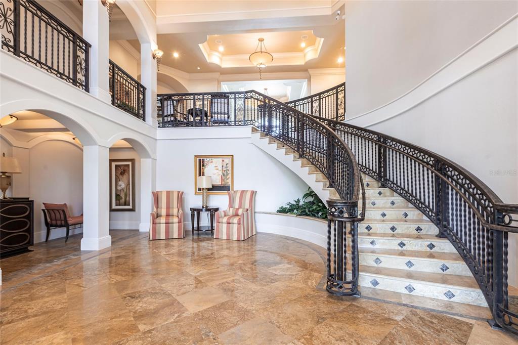3329 Sunset Key Circle, Unit 107 Punta Gorda, FL 33955 - Photo 57 of 76 a view of entryway and hall with wooden floor