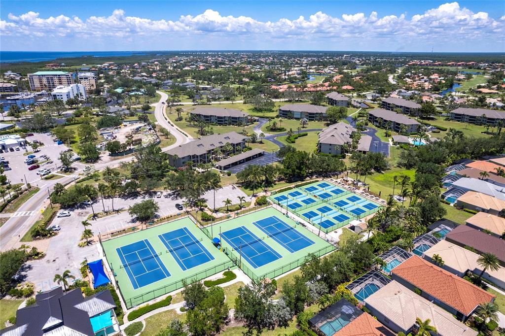 3329 Sunset Key Circle, Unit 107 Punta Gorda, FL 33955 - Photo 66 of 76 an aerial view of residential houses with outdoor space