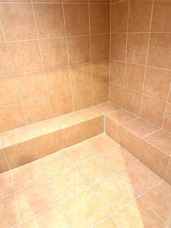 3329 Sunset Key Circle, Unit 107 Punta Gorda, FL 33955 - Photo 73 of 76 a bathroom with a bathtub