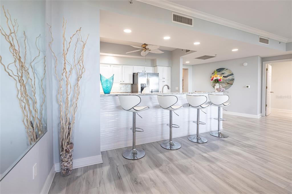 3329 Sunset Key Circle, Unit 107 Punta Gorda, FL 33955 - Photo 10 of 76 a view of a kitchen and dining room