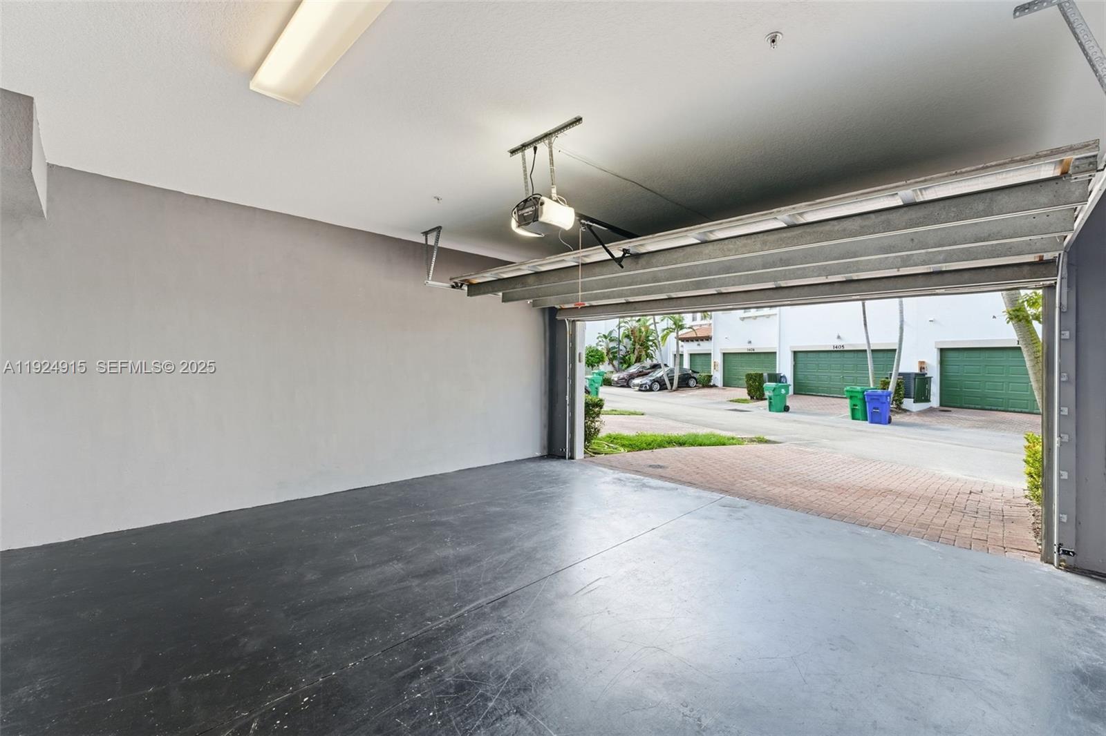 2651 Southwest 119th Terrace, Unit 1109 Miramar, FL 33025 - Photo 7 of 25 a view of a room with large windows