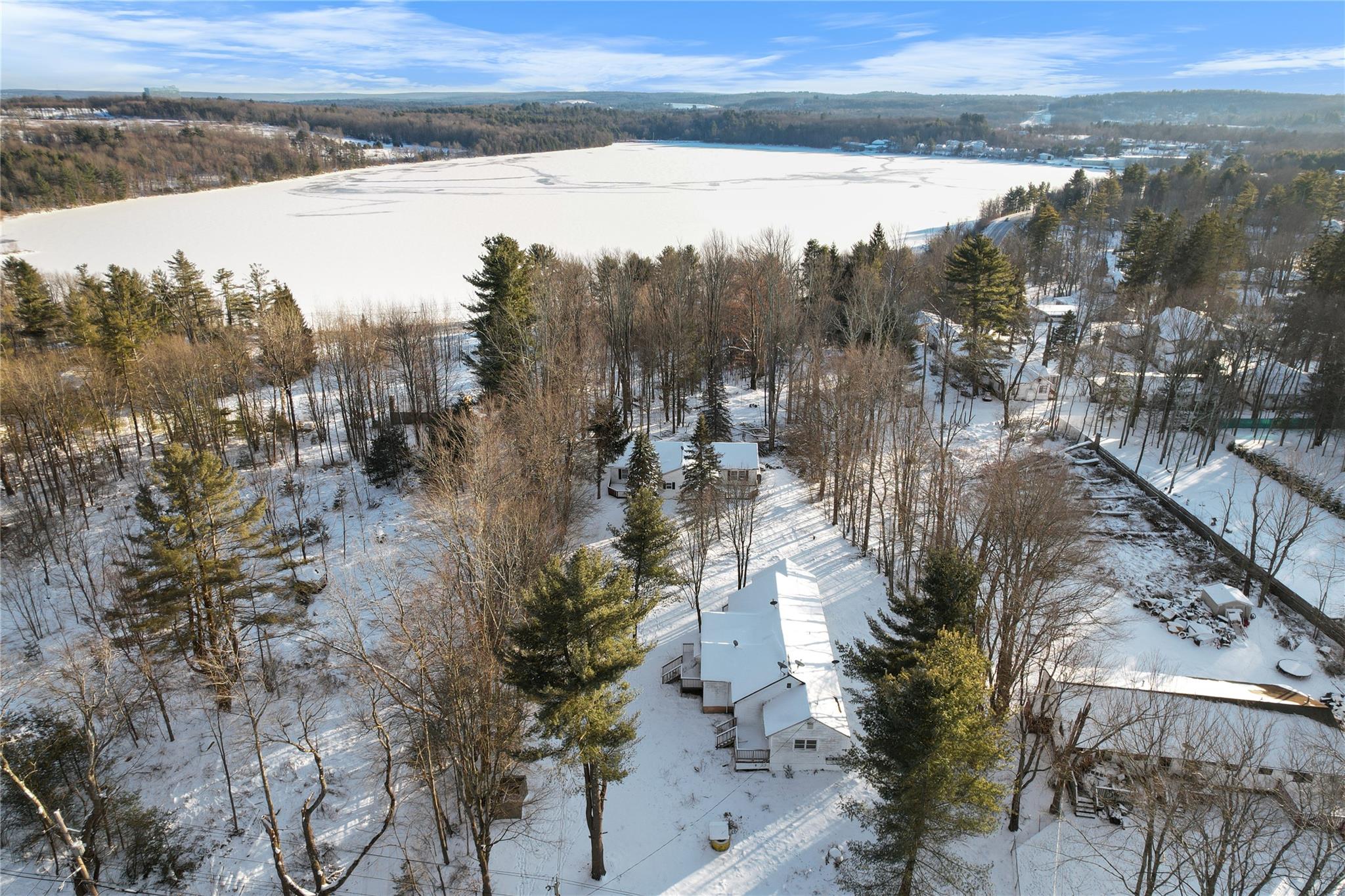 380 Fraser Road Kiamesha Lake, NY 12751 - Photo 16 of 24 a view of a lake from a yard