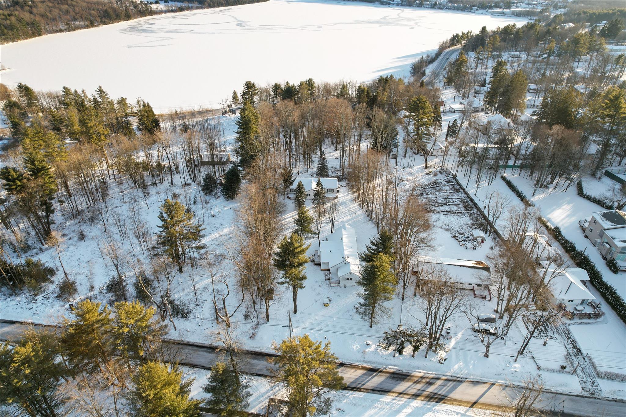 380 Fraser Road Kiamesha Lake, NY 12751 - Photo 18 of 24 a view of a city with tall trees