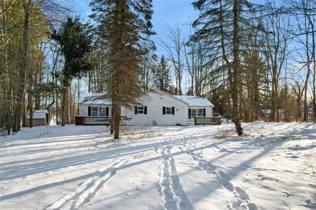 a house with trees in front of it