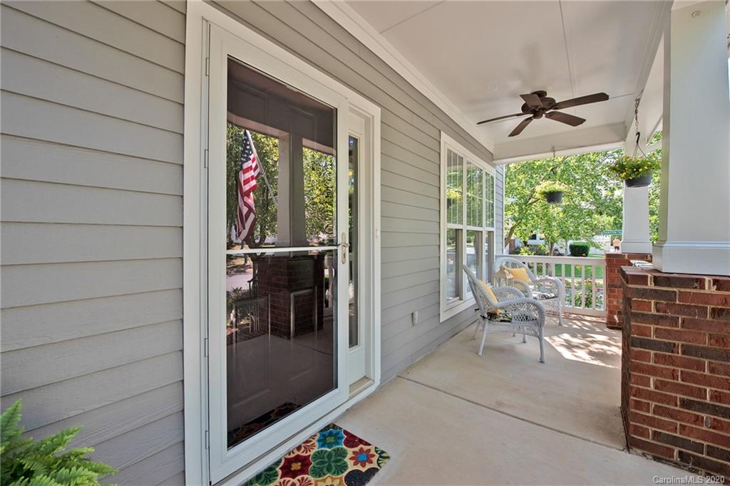 8147 Townley Road Huntersville, NC 28078 - Photo 3 of 35 a view of a porch with a table and chairs