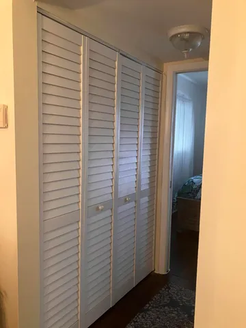 a view of hallway with shower