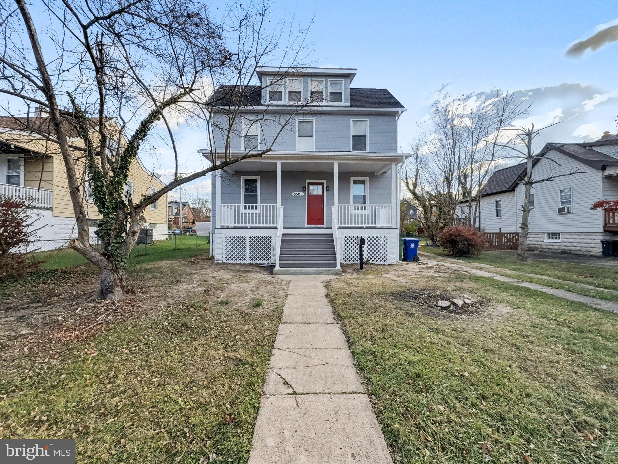 5505 Tramore Road Baltimore, MD 21214 - Photo 22 of 28 a front view of a house with a yard