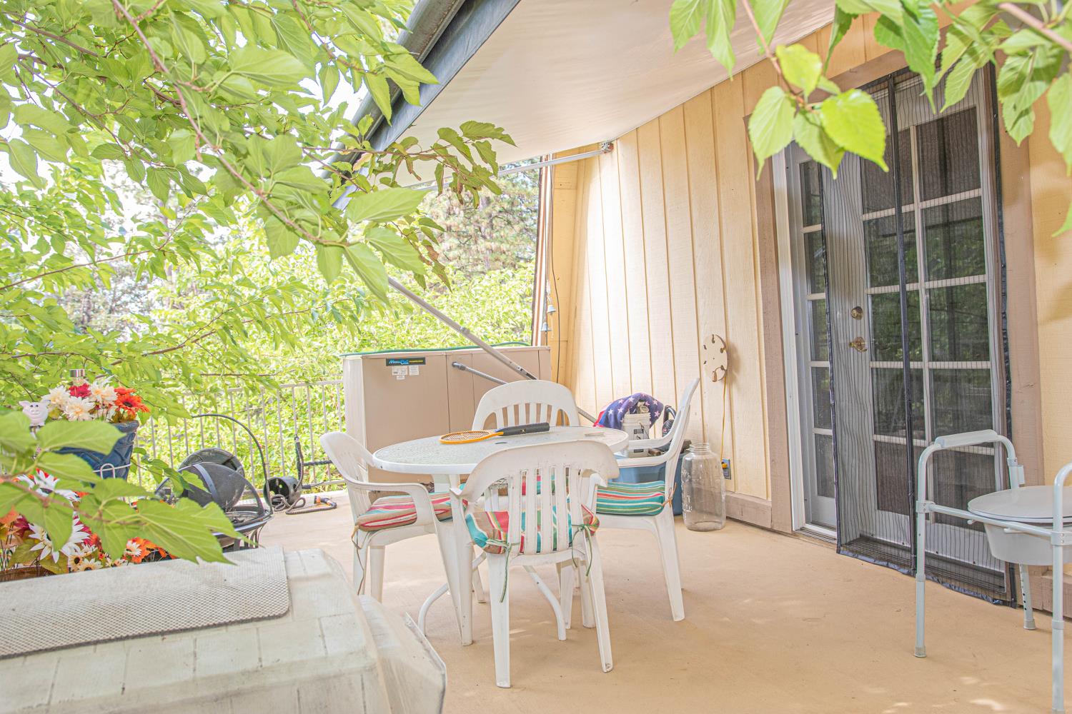 5010 Hope Mountain Road Georgetown, CA 95634 - Photo 17 of 42 a view of an outside dining space with furniture and garden view