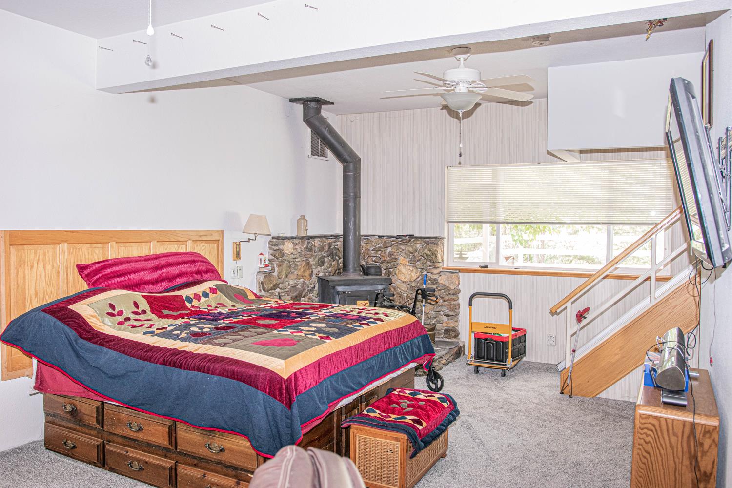 5010 Hope Mountain Road Georgetown, CA 95634 - Photo 19 of 42 a bedroom with a bed and window