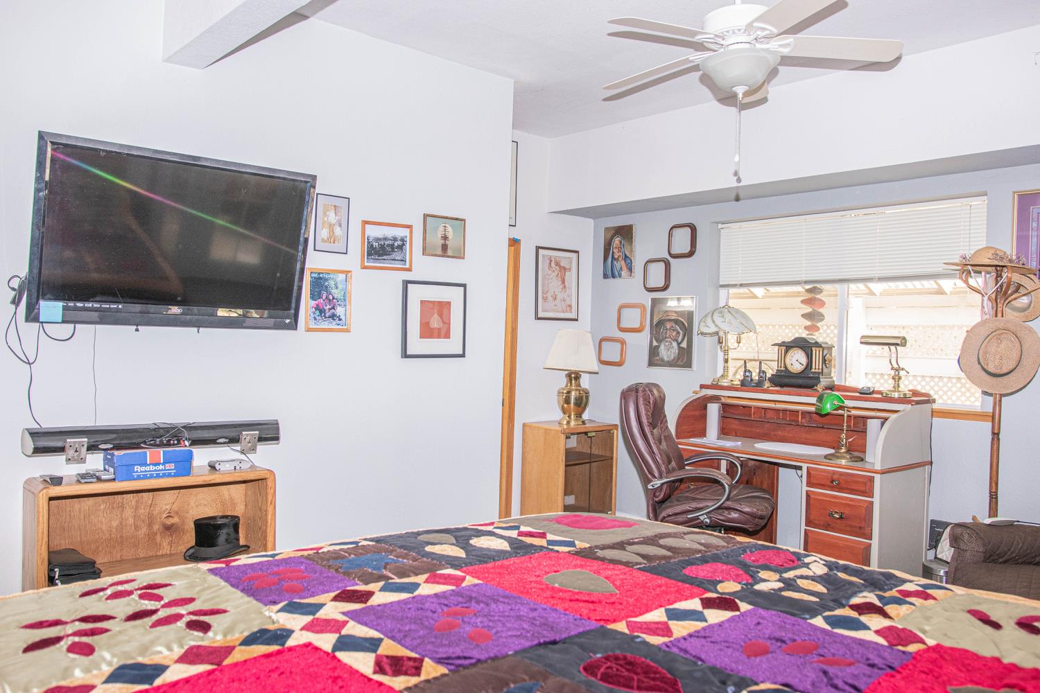 5010 Hope Mountain Road Georgetown, CA 95634 - Photo 22 of 42 a bedroom that has a bed and a chair in it