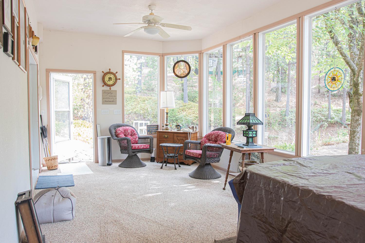 5010 Hope Mountain Road Georgetown, CA 95634 - Photo 24 of 42 a living room with furniture and large windows