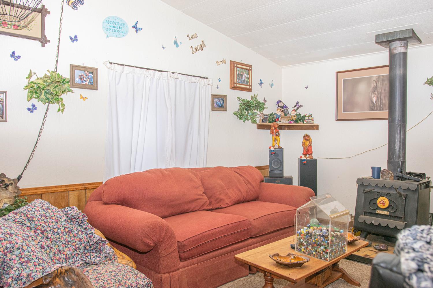 5010 Hope Mountain Road Georgetown, CA 95634 - Photo 32 of 42 a living room with furniture and a couch